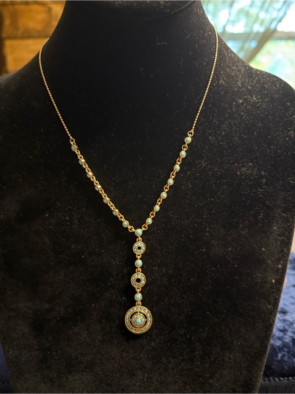 Vintage Monet Y darkened gold tone necklace with turquoise color stone